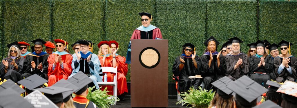 Dean Anthony Bailey addressing the 2025 Bovard College graduates.